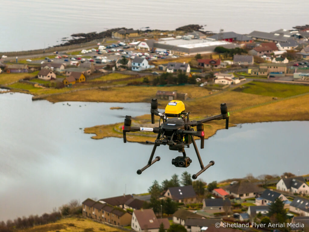 AVSS drone parachute recovery system fly over people